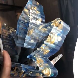 Clear and light blue ashtray with glitter